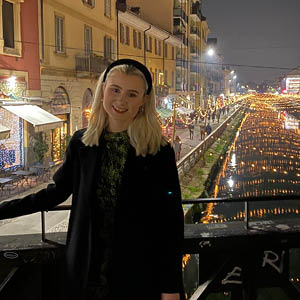 picture of beckie stood on a bridge smiling